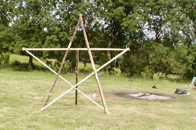 A wooden pentagram that was erected at a camp